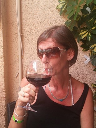 Michele on holiday in Tenereiffe, enjoying a rathe large glass of red xx