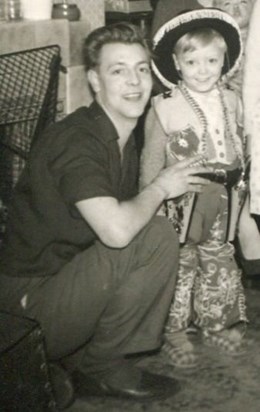 A cowboy even then, with his much loved dad.