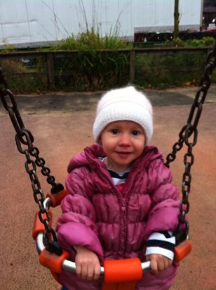 Lily on the swings