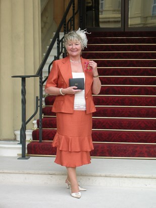 Sandra receiving her OBE in 2007