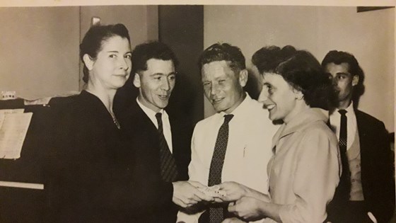 Mum no doubt receiving an award with Dad in attendance to have a celebratory drink!