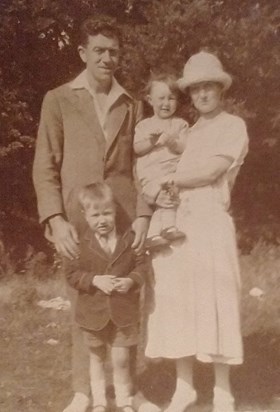 Joan with her mum and Dad and elder brother Syd
