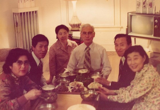 The three brothers with their respective wives in Paulina apartment, Chicago, 1975.