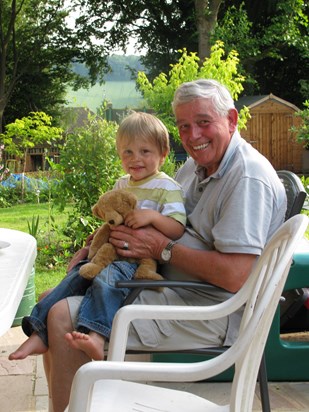 Stanley and grandad Tony in the garden