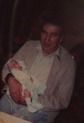 Bob with his first grandchild Kelly, 1986