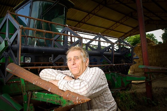 Dad pictured with his combine on the farm in 2009.