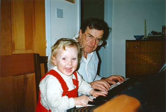 Playing music with his grandson