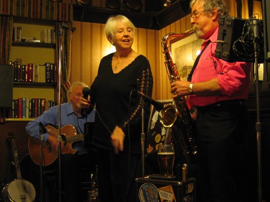 Ken loved having fun with the lady singers.   (With Pat Osborne at the Olde Smokey).