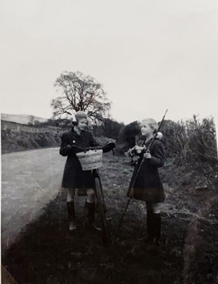 Judy with her bike and Ruth with her stick