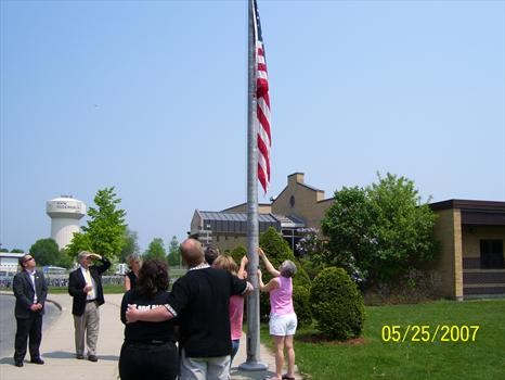 Flag Being Lowered By Mrs.Smith & Mr.Pinkerton