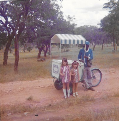 Deborah and Anita next to the 'Stop me and buy one'  Sinoia Caves Zimbabwe 1975