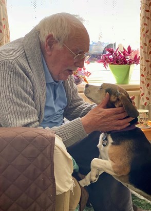 Len never lost his love of dogs. This is Len winning over our nervous rescue, Katie,  in July 2020. 