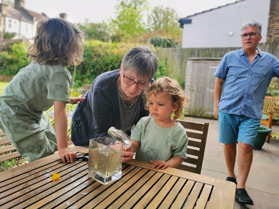 Oscar and Arthur pond dipping with Debbie and Michael 