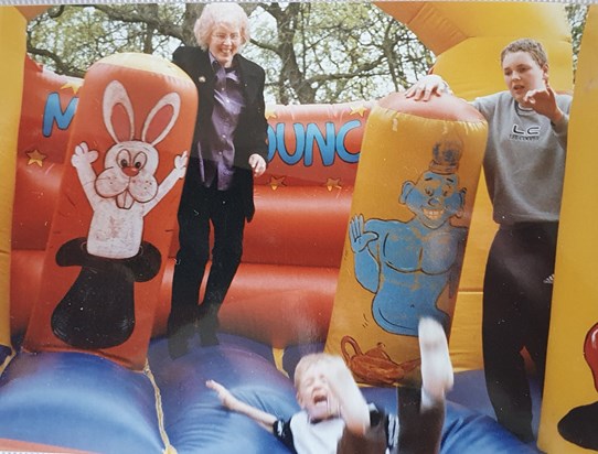 Ben and Nanny on bouncy castle   around 2001