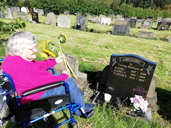 Mum visiting her parents grave last year xxx