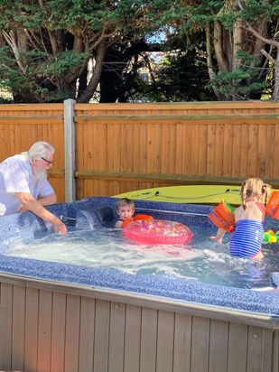 Swimming lessons in the hot tub. 