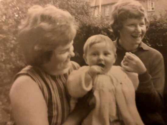 Mam holding me with Louise early 1963