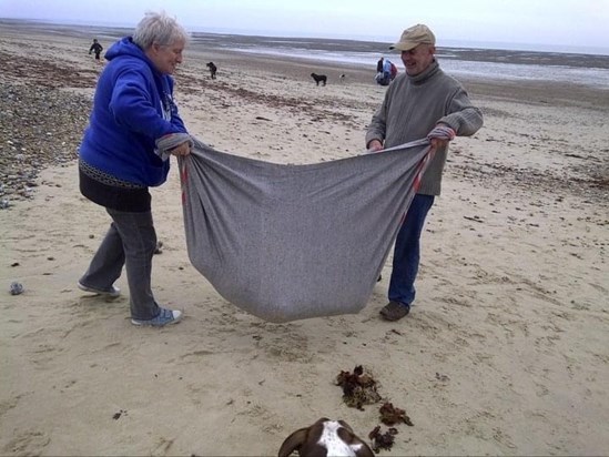 Mum and dad used to swing us in the blanket every time we went to the beach!