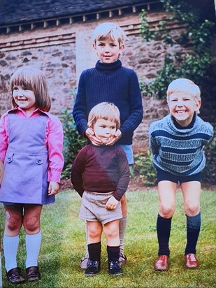 Neal on the right (long socks and shiny shoes were not really his thing later in life...)