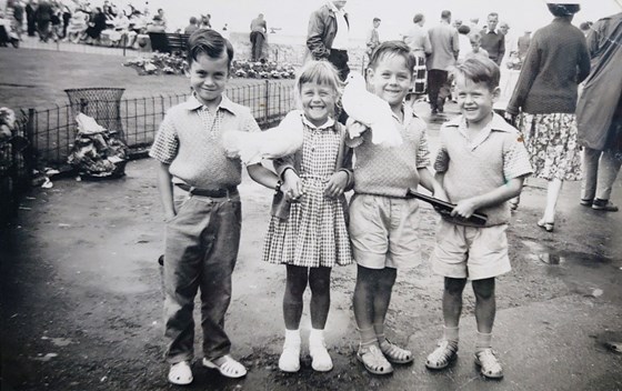 Baby Chrissy with her brothers 