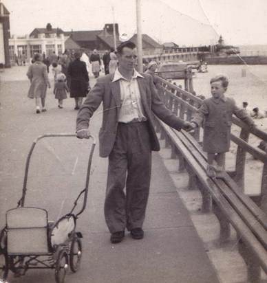 Dad taking John for a walk on Gorleston seafront