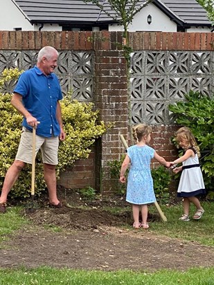 The Crofton, Lilly, Poppy and Phil planting Will’s tree 