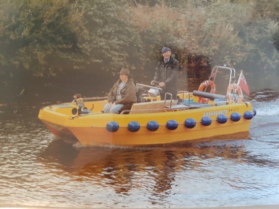 Happily steering the 'Little yellow boat' for passengers on the Tone