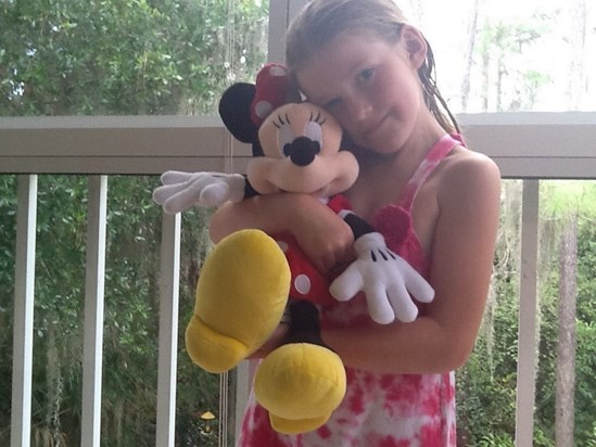 Emma in Florida 10/9/14 with her new Minnie Mouse toy! X
