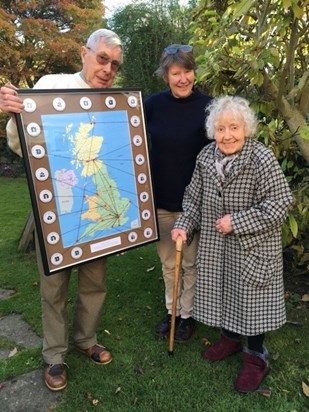 Trevor Jarvis & Liz Colebrook presenting Eileen with a map of  her cycling records