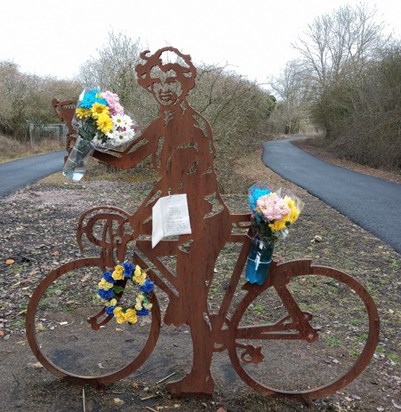 Eileen's sculpture on the Lias Line, near Offchurch, Warwickshire. Flowers and card from the Coventry Cycling Club