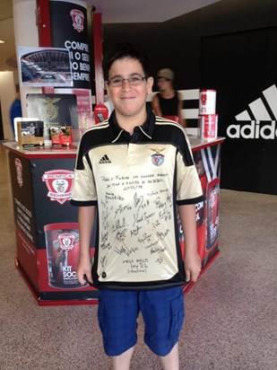 So happy with his signed Benfica shirt 