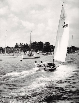 Peter in a Merlin Rocket planing at speed up the River Hamble c 1960