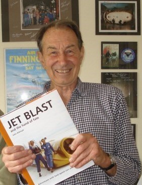 John with a copy of his book
