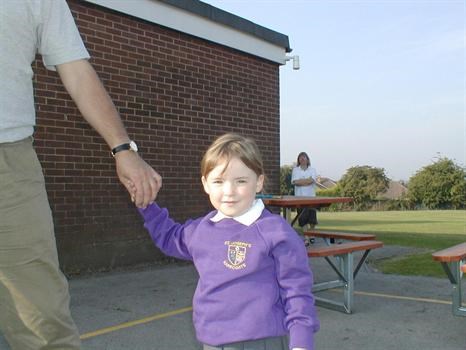First day at school holding daddy's hand...pic chosen by Lydia