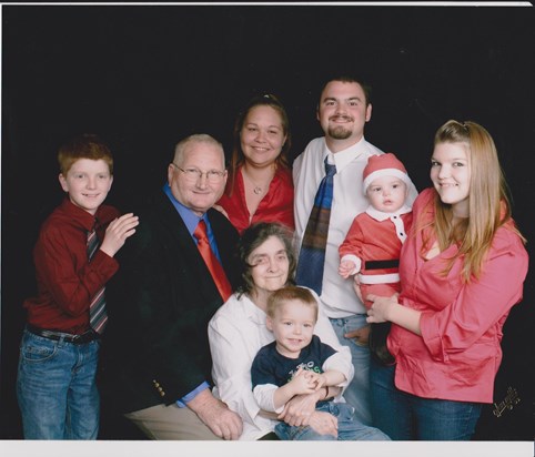 My wife and I with our grandchildren and great grandchildren