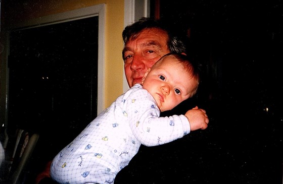 Mike holding his first grandchild Daniel.