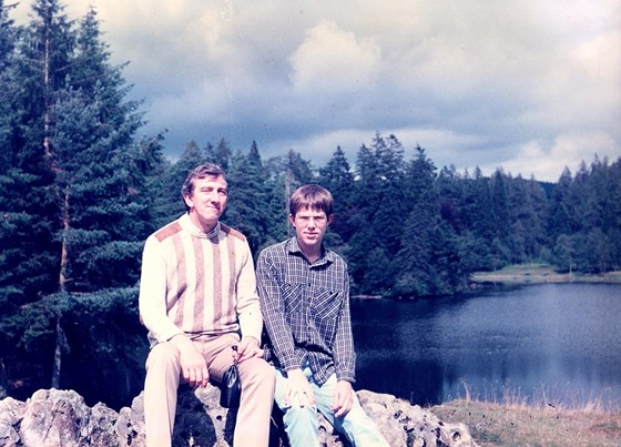 Posing by a lake