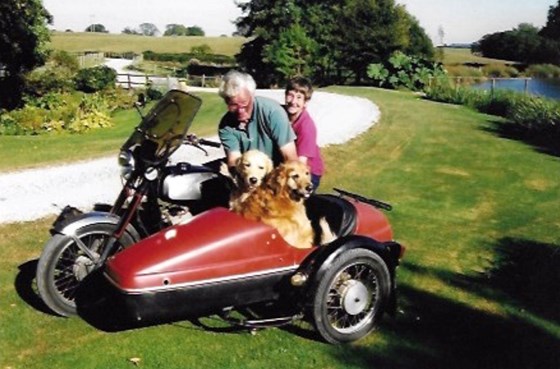 Chris and Cleo having fun with the dogs in the Jawa