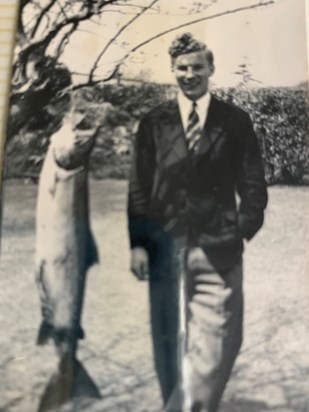 Chris and a huge salmon - caught at Canford School!