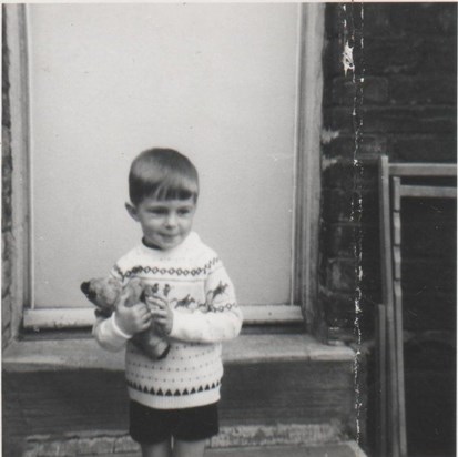 Alek with his favourite teddy bear,aged 4