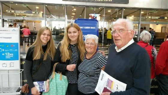 In the airport, on our way to England for the summer.