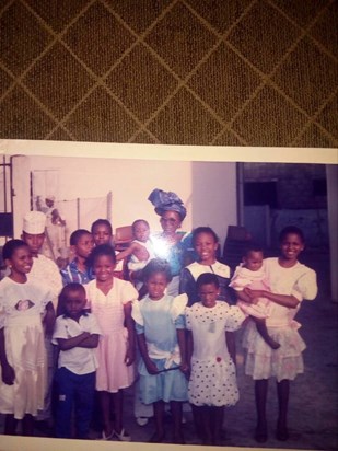 With her children, nieces and nephews, December 26th 1990 at her Brother, Emenem's wedding.
