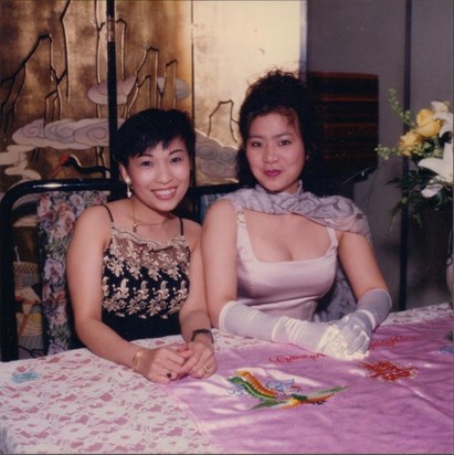 Suong ans cousin Thu at her sister's wedding, Houston, Texas.