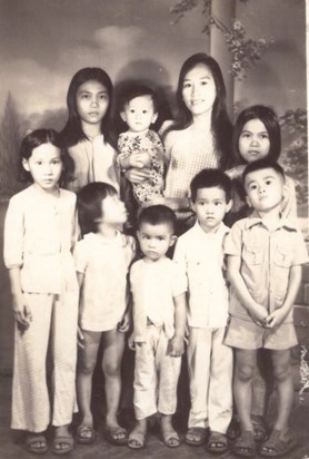 Suong (middle) and family, circa 1976