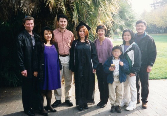 Suong (middle) and friends at graduation, California, 1999
