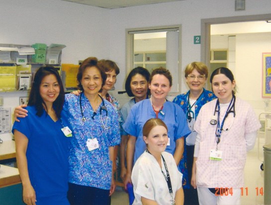 Suong (left) and co-workers at the hospital