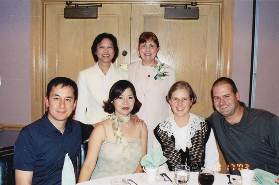 Suong (second from left) with husband (left) and friends