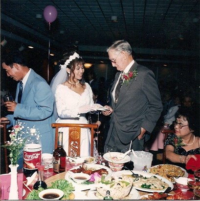 Suong and father-in-law, Sam, at her wedding