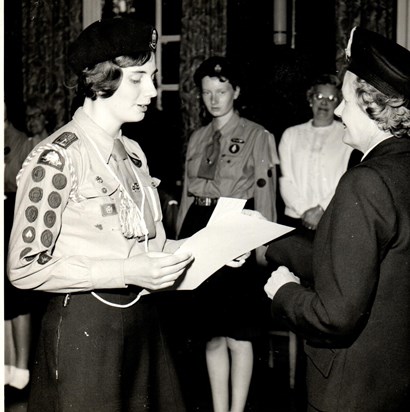 Receiving her Queen's Guide badge