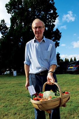 Gordon Peters and trug of allottment produce in Cuckfield
